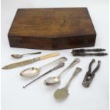 Assorted items to include a silver handled button hook, American Sterling silver dessert spoon,