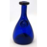 A Bristol Blue style glass wine Carafe having iridescent finish to spout and stylised face