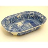 An English ' Semi China ' blue and white transfer printed dish,