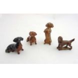 A collection of three Beswick models of Dachshund's to include number 1460 in black and tan gloss