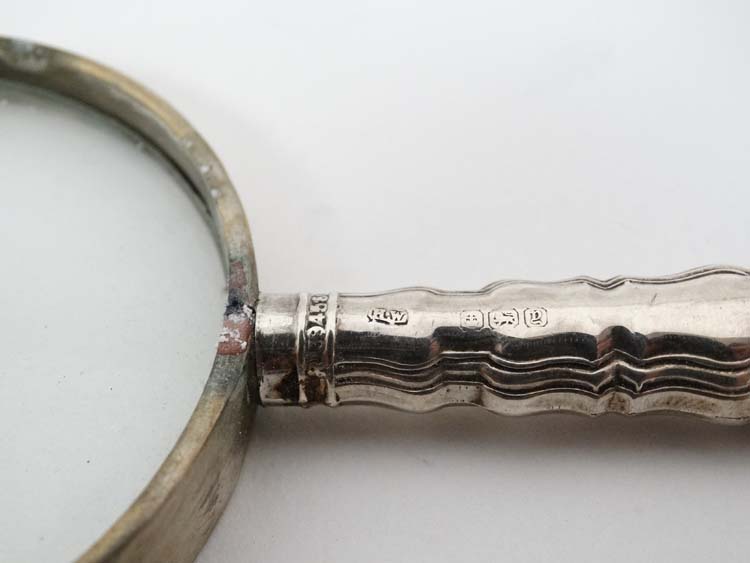 A silver handled magnifying glass. - Image 3 of 4