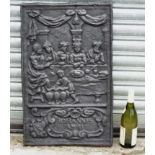 Salvage / Architectural : A 17th/18th C cast iron fire back with figures at a table,