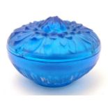 An electric blue glass lidded power pot, signed ' R Lalique' to base. 3 1/4'' diameter.