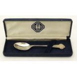 A year '2000' millennium souvenir spoon, hallmarked Birmingham 2000 maker HBH. 4 1/2" long.