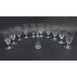 A collection of 10 early 20thC clear glass 'Absinthe' glasses, to include French torsade examples,