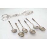 A silver plated pair of asparagus tongs + 6 EPNS apostle tea spoons CONDITION: