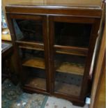 Glazed mahogany bookcase CONDITION: Please Note - we do not make reference to the