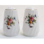 A c1970s Minton '' Marlow'' pattern salt and pepper cruet decorated in polychrome with sprays of