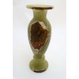 A 1970's green onyx urn.