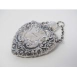 A 21stC heart shaped scent/ perfume bottle marked Sterling 2 1/2" high CONDITION: