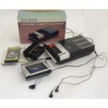 Vintage Retro : a box containing two Sony Walkman s and a TCM-17 Belmax Portable cassette -