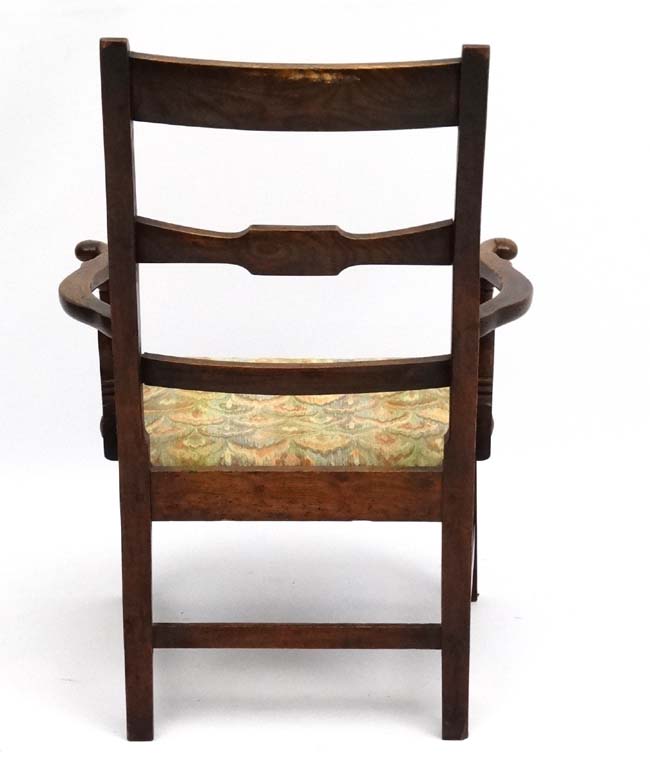 An early 19thC elm country made open armchair with drop in seat and squared tapering legs. - Image 2 of 3