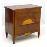 A mahogany and satinwood inlaid three drawer chest with penwork decoration depicting a lion and