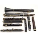 Musical Instruments : A collection of woodwind instrument parts ( B Clarinet , Picolo , flute ) ,
