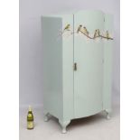 An early 20thC bow front painted wardrobe with hand painted goldfinch bird decoration amongst