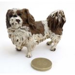 Cold Painted Bronze : a scale figure in liver and white of a Pekinese dog ,