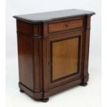 A 19thC Biedermeier style walnut and ebonised wood black marble topped side cabinet 39" high x 18