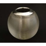 A glass bar top/ table top match striker of spherical glass form with ribbed sides and silver rim