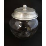 Shop Advertising : A glass jar etched ' Wright and Son' with aluminum lid marked' Meredith & Drews