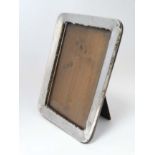 A silver photograph frame hallmarked Birmingham 1915 maker Walker & Hall 1/2" high overall