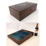 An early Victorian Rosewood writing slope / lap desk with brass inlay with corners of lid.