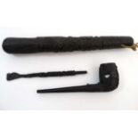 3 items of Irish bog oak to include a small truncheon with shamrock decoration and a pipe and