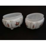 A pair of white / milk glass bough pots with hand painted floral decoration.