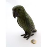 A 21stC Cold painted bronze model of a green parrot.