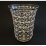 A Mid Century glass vase with retro floral and geometric decoration 7" high CONDITION: