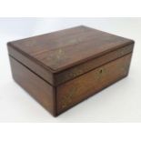 An early - mid 19thC Rosewood hinged lidded box with brass inlay.