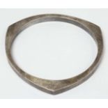 A silver bracelet of bangle form CONDITION: Please Note - we do not make reference
