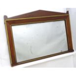 A Regency mahogany and gilt over mantle mirror.