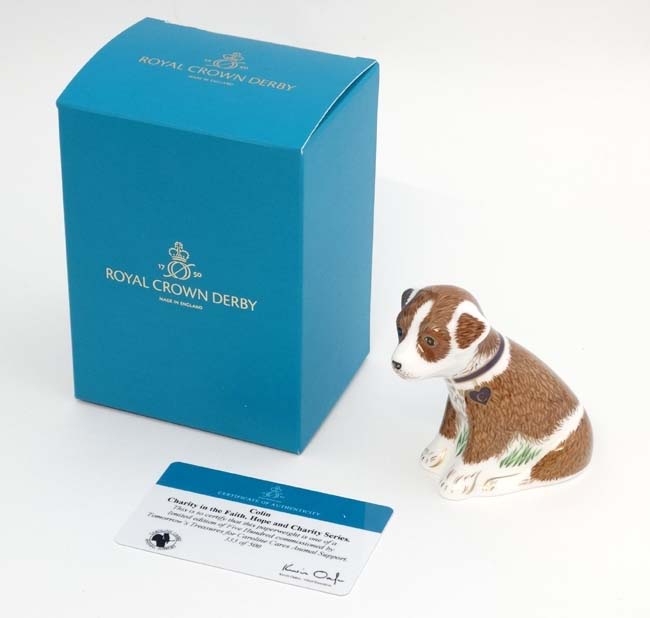 A Royal Crown Derby limited edition fine bone china paperweight ''Colin the puppy'',