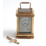 Porcelain panel carriage Clock : a brass cased Carriage timepiece with bevelled glass top,