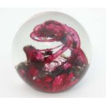 A 1991 Selkirk Glass, Scotland , 'Spindrift' paper weight in red and clear glass, inscribed to base.