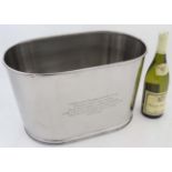A large champagne bucket with engraved verse etc.