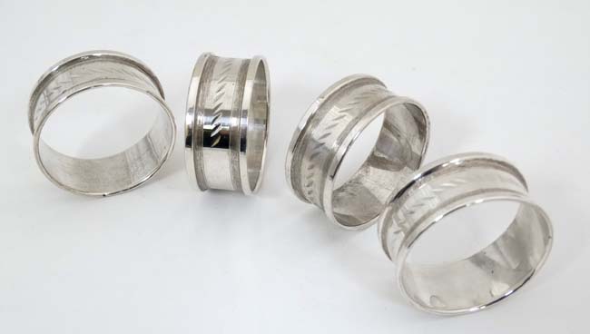 A cased set of 4 silver napkin rings hallmarked Birmingham 1973/74 maker Henry Griffith & Sons Ltd - Image 2 of 4