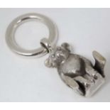 A 925 silver rattle / charm formed as a Teddy bear.