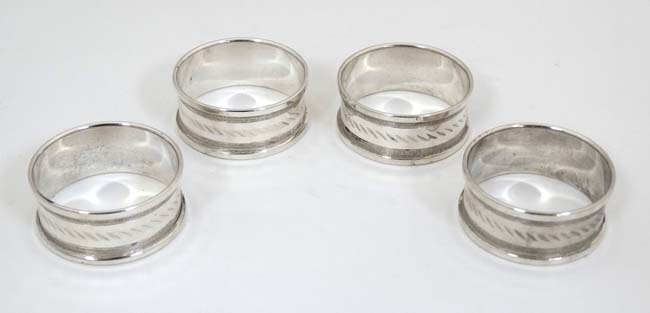 A cased set of 4 silver napkin rings hallmarked Birmingham 1973/74 maker Henry Griffith & Sons Ltd - Image 4 of 4