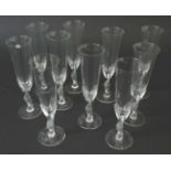 A set of 10 Faberge France champagne flutes with frosted Kissing Dove decoration. Marked under.