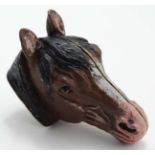 A Novelty cold painted vesta case formed as a horses head.