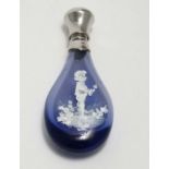A blue glass scent / perfume flask with Mary Gregory style decoration and silver plate top 3 1/4"