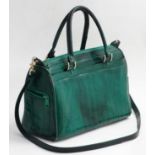 An Eel skin emerald green handbag, with detachable strap, 8'' high,