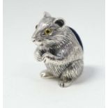 A novelty silver pin cushion formed as a hamster . Marked 'Sterling'.