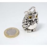 A silver pendant / large charm formed as an owl 1 3/4" high CONDITION: Please Note