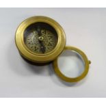 A 21st C brass Compass with magnifier, 2 3/4'' diameter,