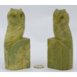 A pair of soapstone bookends formed as owls.