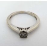 A 14ct white gold ring set with diamond solitaire CONDITION: Please Note - we do