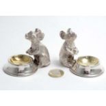 A pair of novelty silver plate table salts with seated mouse decoration 2 1/4" high