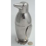 A Novelty cocktail shaker formed as a penguin 7 1/2" high CONDITION: Please Note -
